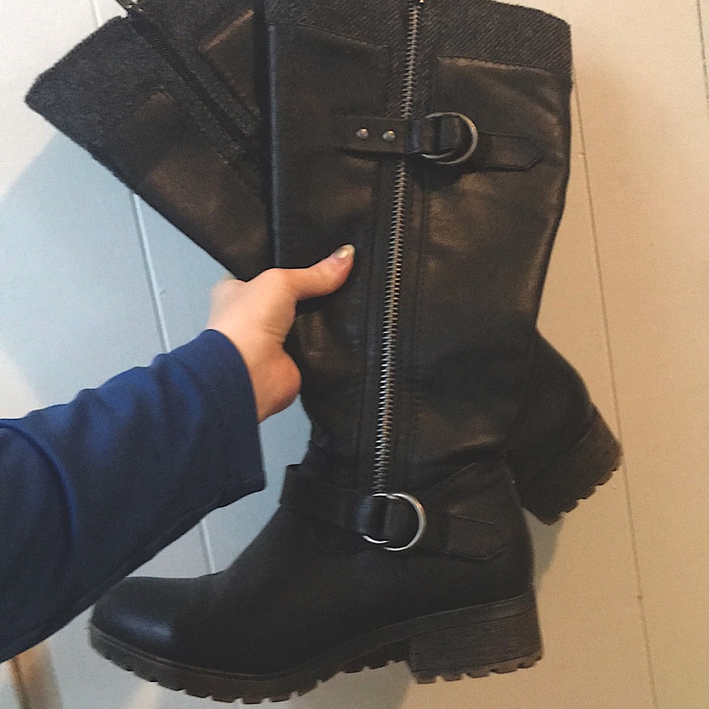 Worn (maybe once) knee high boots.